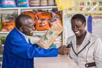 A vendor and customer in a transaction.