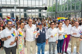 Wilson castañeda (left), director of caribe afirmativo director, with government officials at the international day against homophobia, biphobia, and transphobia event.