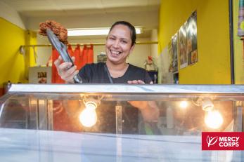 A business owner at work in their store.