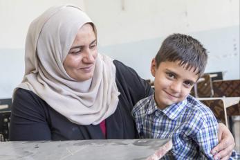 Grandmother and grandson in iraq