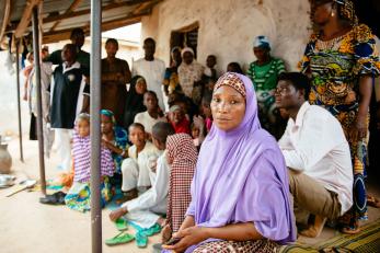 Nigerian woman within community group.