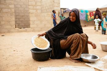 Nigeria woman with seeds