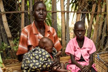South sudanese woman and her children
