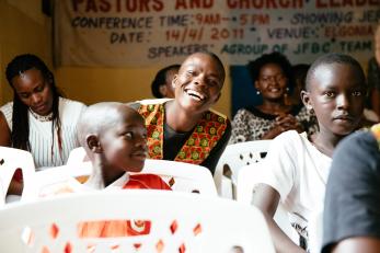 Kenyan community members gather together.