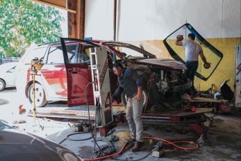 Men working on a car