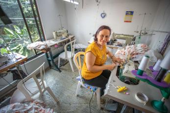 A seamstress working on a sewing project.