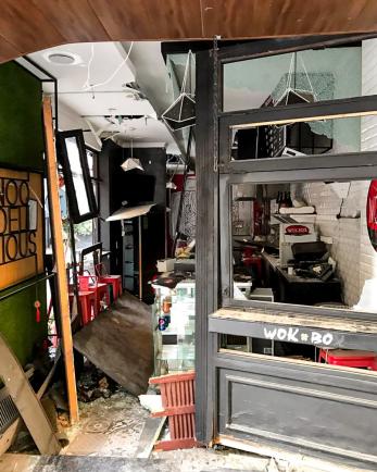 The interior of a business in lebanon with broken glass, destroyed fixes, 