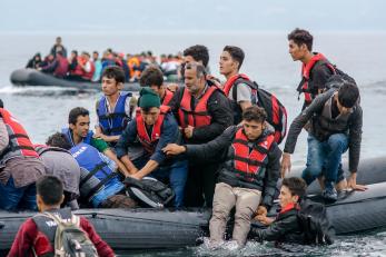 Refugees on inflatable boats