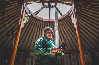 woman in Mongolia with a drone