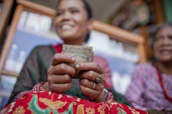 Woman holding cash