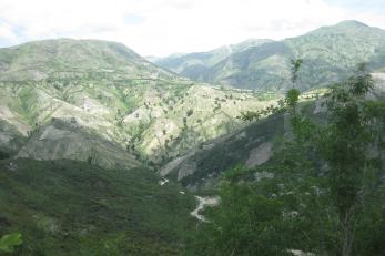 The coastline of Ti Bwa, with its steep hillsides and rough terrain, is typical of the many Haitian mountain towns that suffer from deforestation and erosion. Photo: Rae Lyon/Mercy Corps