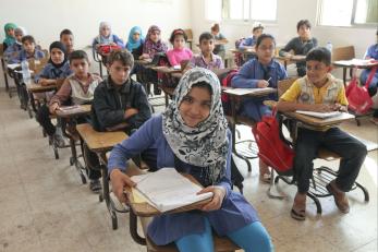 Students at desks in Jordan