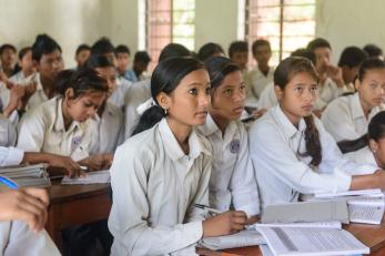 Sarmila Sarki, 18, may become the first Dalit girl from her village to ever finish the 10th grade. Here she is pictured sitting in class.