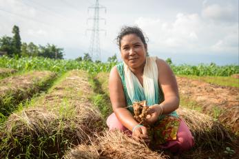 Santu once had a bountiful ginger harvest, but then lost it all to disease. A Mercy Corps program helped her build back her farm and prepare for the future. Photo: Miguel Samper for Mercy Corps