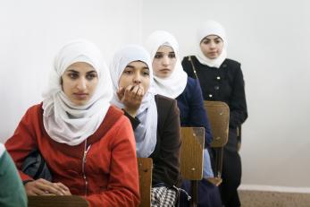 Syrian and Jordanian women in a classroom.