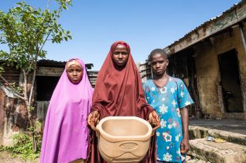 Nigerian siblings struggling with hunger.