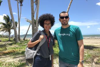 Karla Peña, Mercy Corps resilience program manager, and Hector Mujica, regional manager for Google.org, in Humacao, Puerto Rico. Photo: Christy Delafield/Mercy Corps