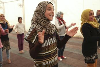 Syrian girls singing and clapping.