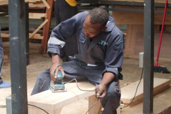 man woodworking
