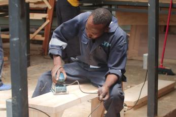 man woodworking