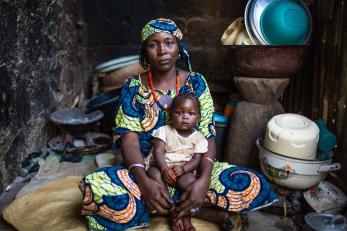 woman and child sitting at home