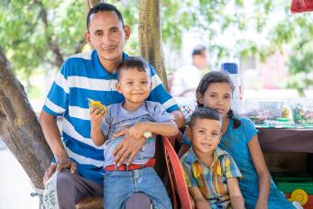 A man with three children in Colombia