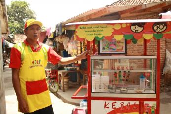 man with food cart