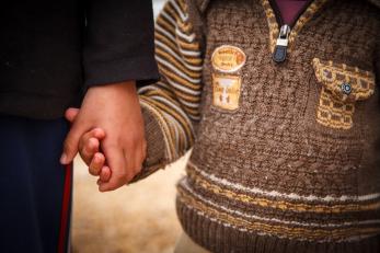 two people holding hands