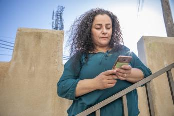 woman holding mobile phone