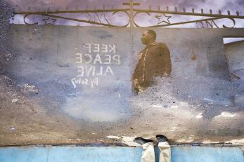 Reflection of mural in pool of water