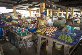 Sarah, 46, grows and sells cassava, onions and other vegetables as a way to help her husband earn a living and feed their children. But when Ebola hit this area of Liberia, officials tried to stem its spread by restricting travel and public gatherings. "There was no way to get to the market," she says. One of Mercy Corps’ main objectives in Liberia was to improve food security in the wake of the Ebola crisis. Photo: Sean Sheridan for Mercy Corps