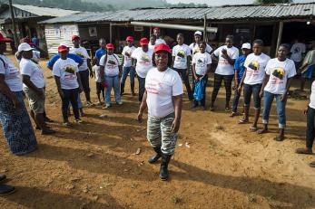 During the 2014 Ebola outbreak, community educators for the Centre for Liberian Assistance mobilize in Robertsport for a community outreach event on the dangers of Ebola. Photo: Sean Sheridan for Mercy Corps