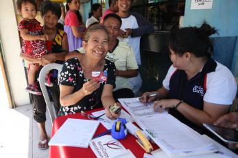 lady holding a voucher