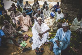 A group of people sitting together.