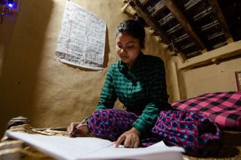 A young person studying.