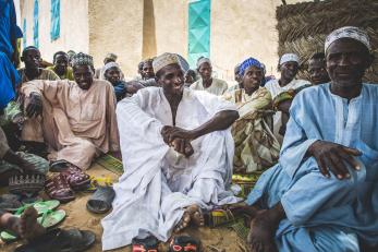 A group of people sitting together.