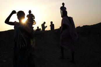 Silhouettes of various people.