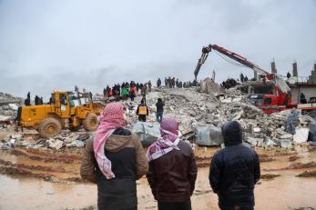 In Sarmada, Northwest Syria, rescue crews rush to a collapsed building in the wake of massive earthquakes that struck the region.