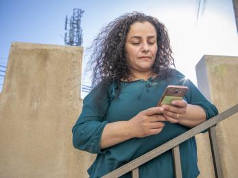 woman holding mobile phone