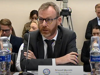 Man testifying in Congress.