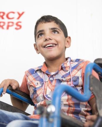 boy in Jordan in a wheelchair