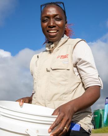 Mercy Corps Zimbabwe employee smiling at the camera