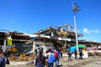The Tacloban Airport was barely standing after Haiyan ripped through its roof and walls. The airport was the scene of chaos for days after the storm as people desperately tried to get off the island for help. Photos: Dewi Hanifah/Mercy Corps