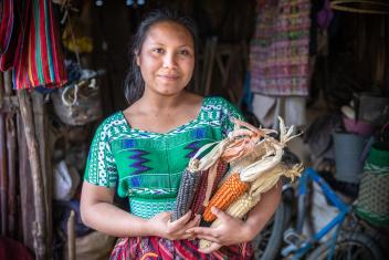 Olga learned farming techniques from Mercy Corps in Guatemala and tripled her family’s farm land. She also learned to save, returned to school, and is studying to be a teacher.