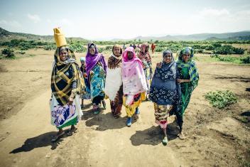 Market connections are a critical way to help families stabilize their incomes and build more secure lives. Through a Mercy Corps program, women in rural communities now sell their livestock's milk to a processing plant in a nearby city. Photo: Sean Sheridan for Mercy Corps