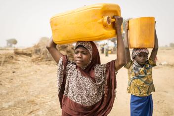 3:16 p.m. — Back to the well, Badariya fetches water to bring to the families' cows. “I don't like carrying that big jug to get water,” she tells me when I ask about the hardest part of her life.