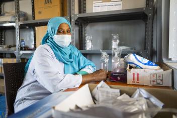 Amna is a midwife at the Um Rakuba camp’s health center pharmacy.
