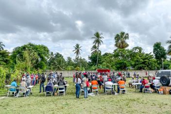 L’Asile residents pick up essential supplies at a distribution event. The community is in a rural and difficult to reach area where people may not have access to supplies otherwise.