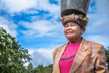 Agustina, an Indonesian coffee farmer and preschool teacher, participated in a Mercy Corps program supported by The Starbucks Foundation to become a community health volunteer. She was trained in topics that included health care, immunizations, hygiene, and child nutrition, and now plays a critical role in educating her neighbors about improving health outcomes.