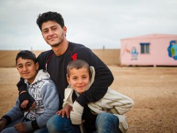 Sami is a volunteer at one of mercy corps' child-friendly spaces in zaatari camp. his work has given him a new sense of purpose, and he's now sharing that with others. photo: sumaya agha for mercy corps